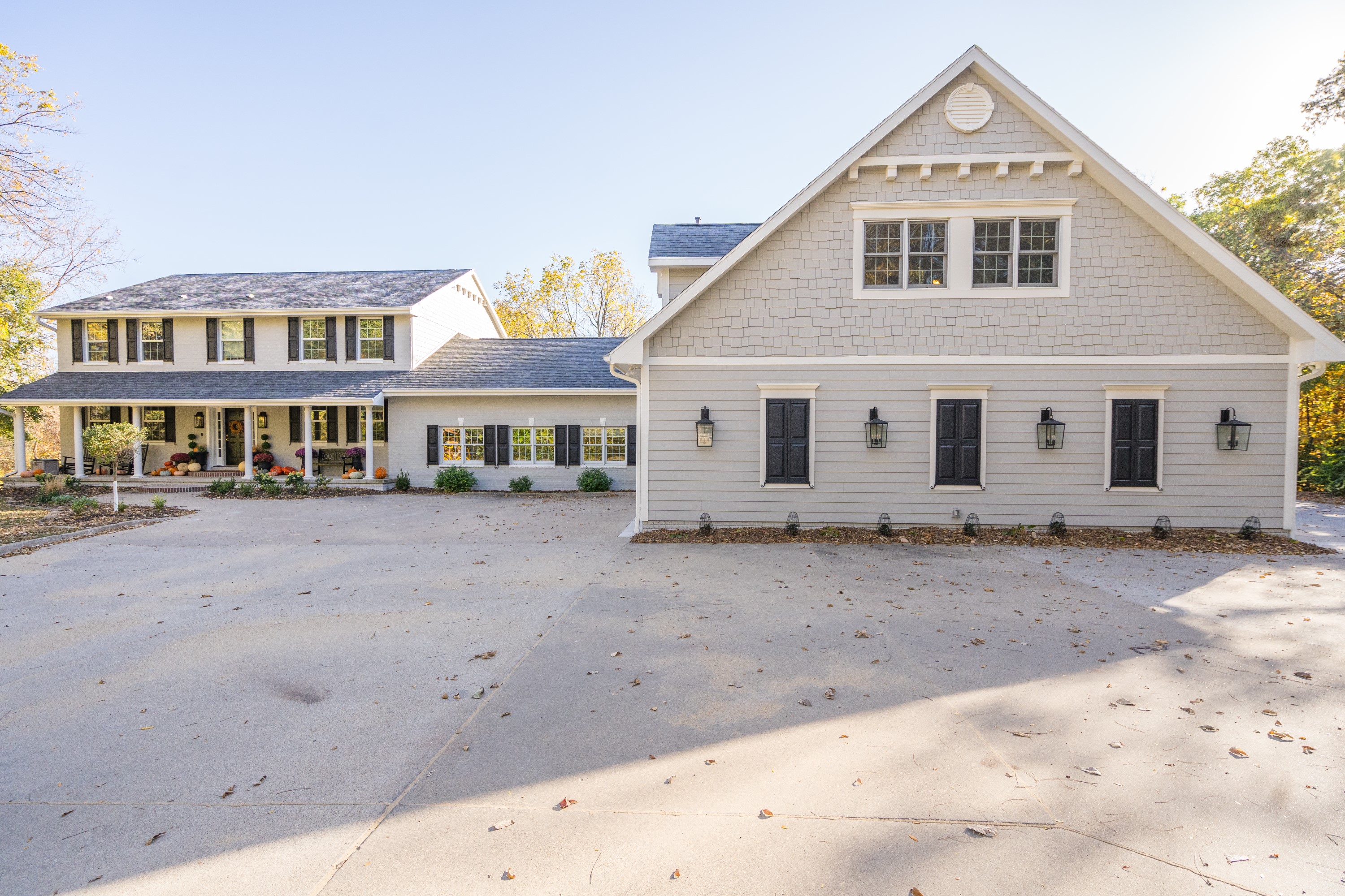 Custom home with carriage house garage and covered porch