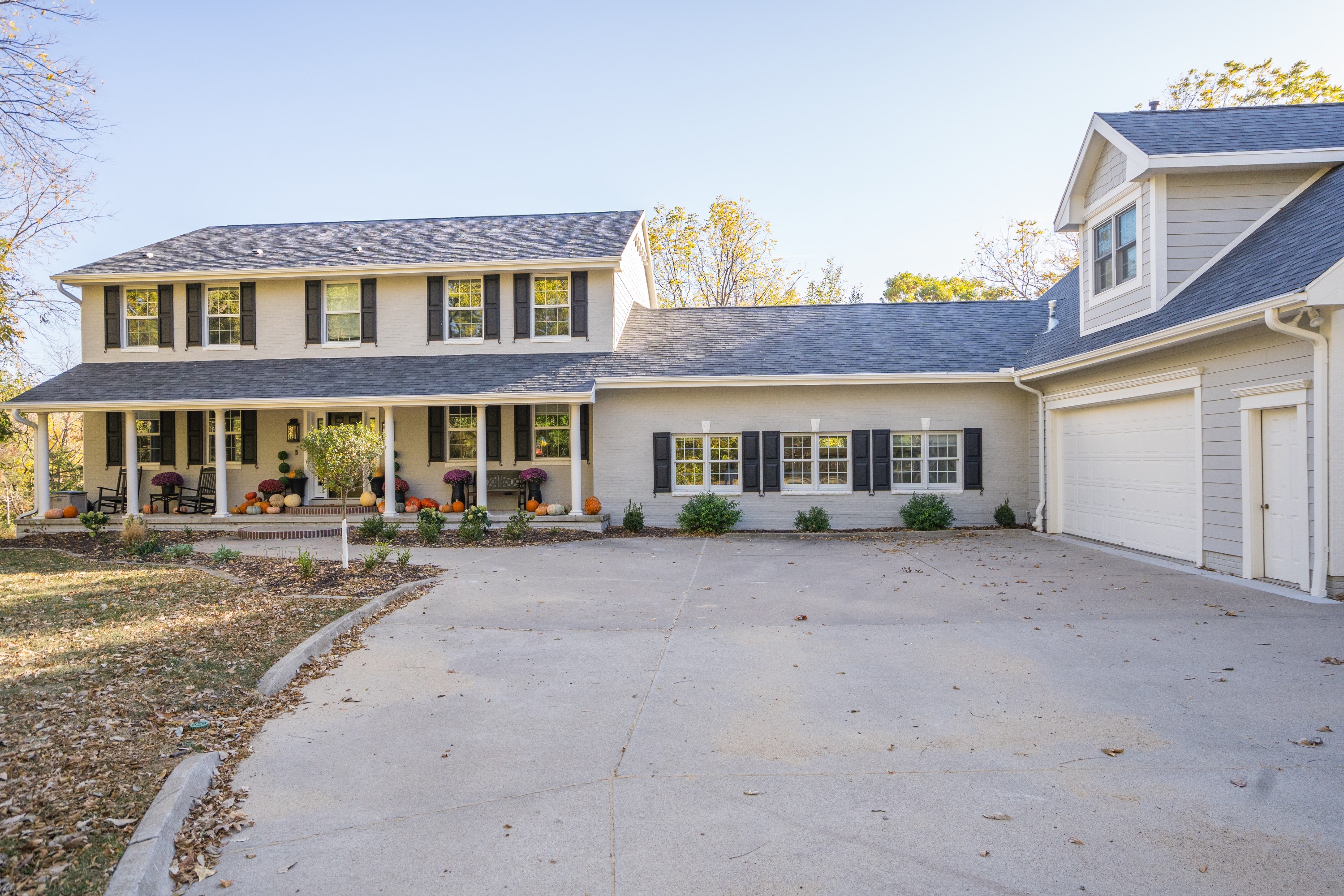 Custom home exterior with fall landscaping