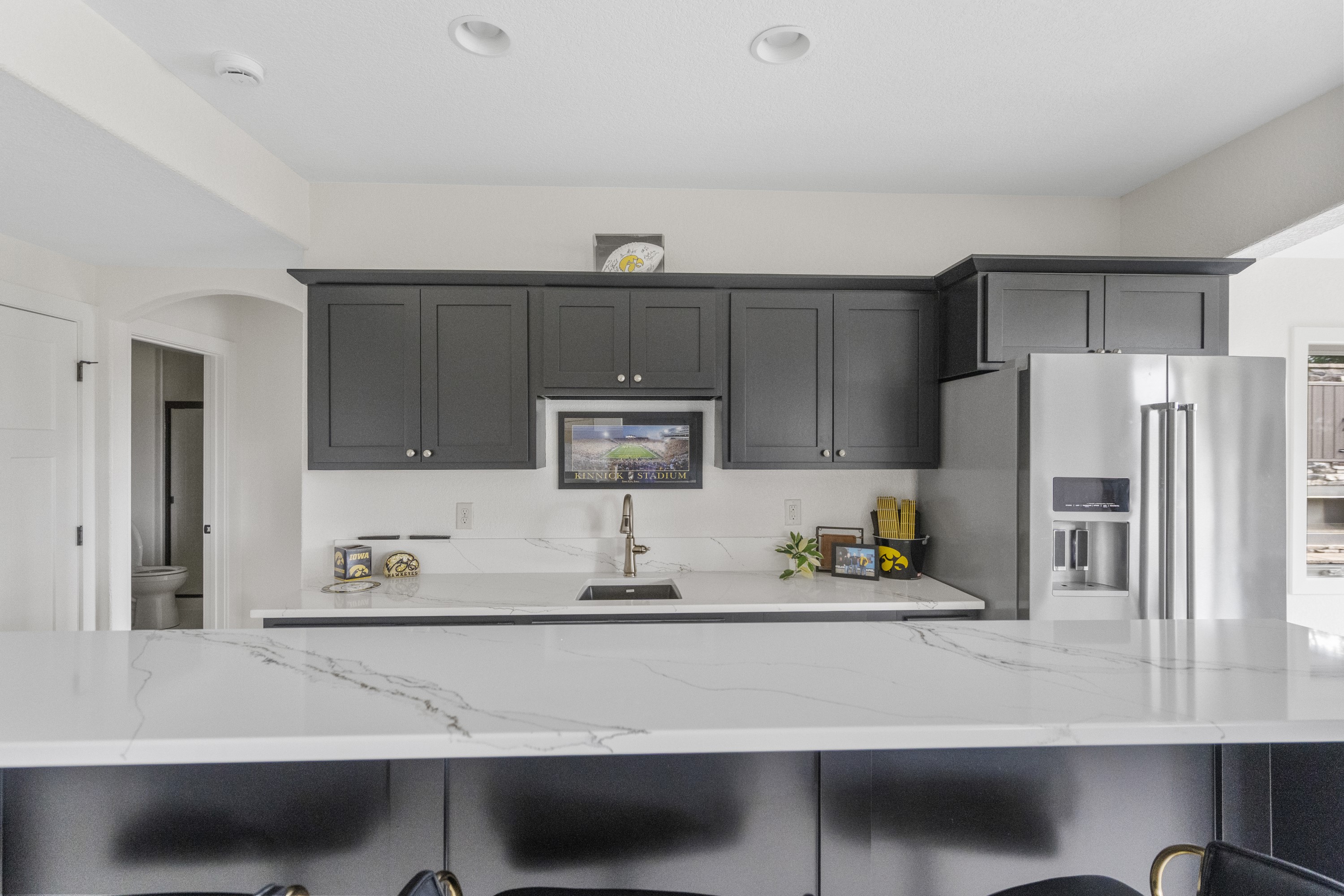 Bathroom with quartz vanity and modern fixtures