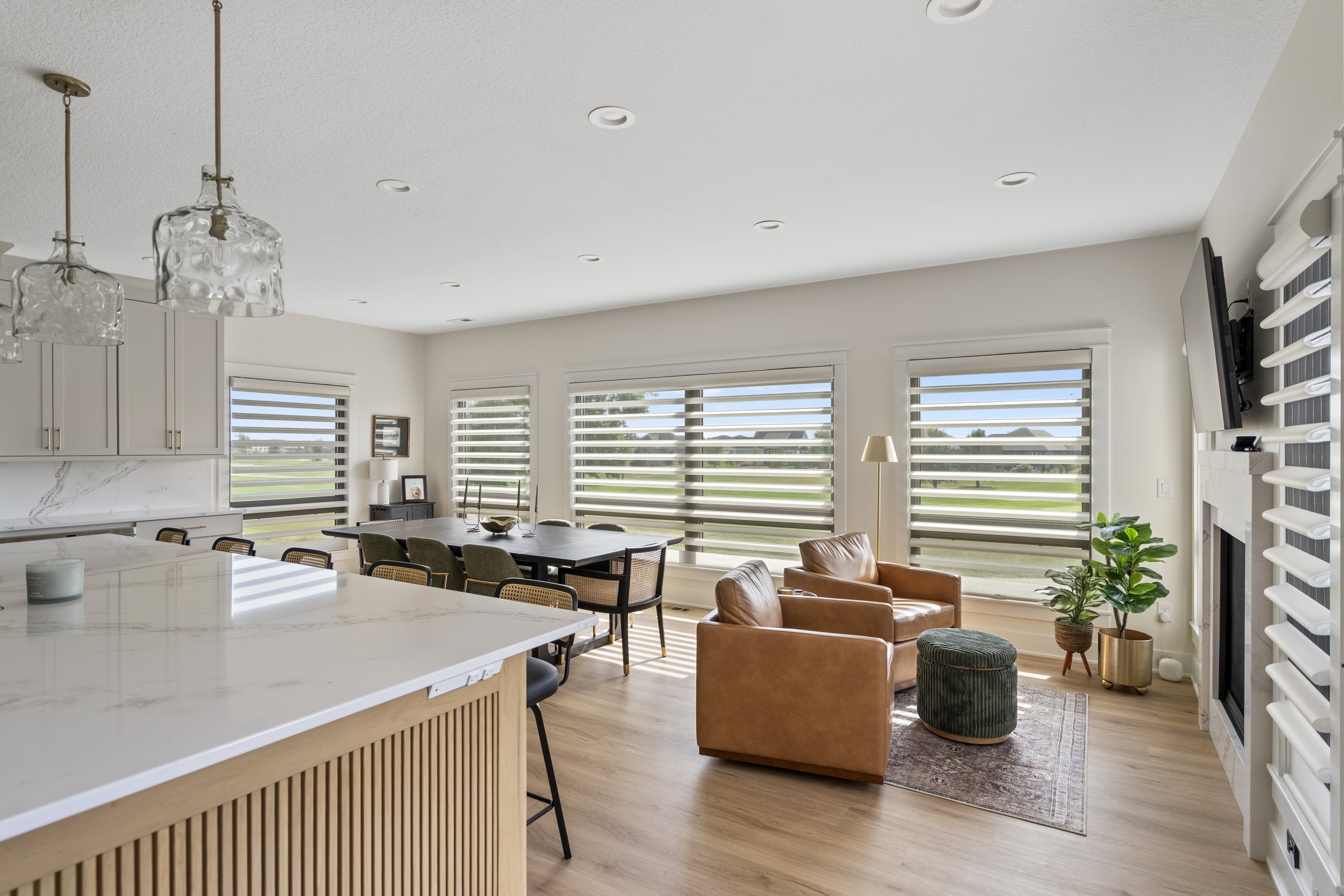 Open concept living and dining with fireplace