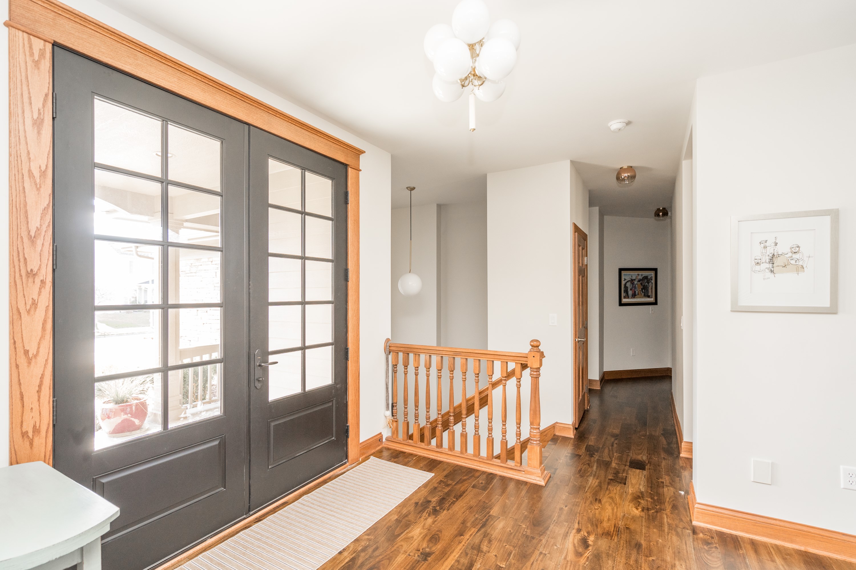 Entry with French doors and hardwood floors