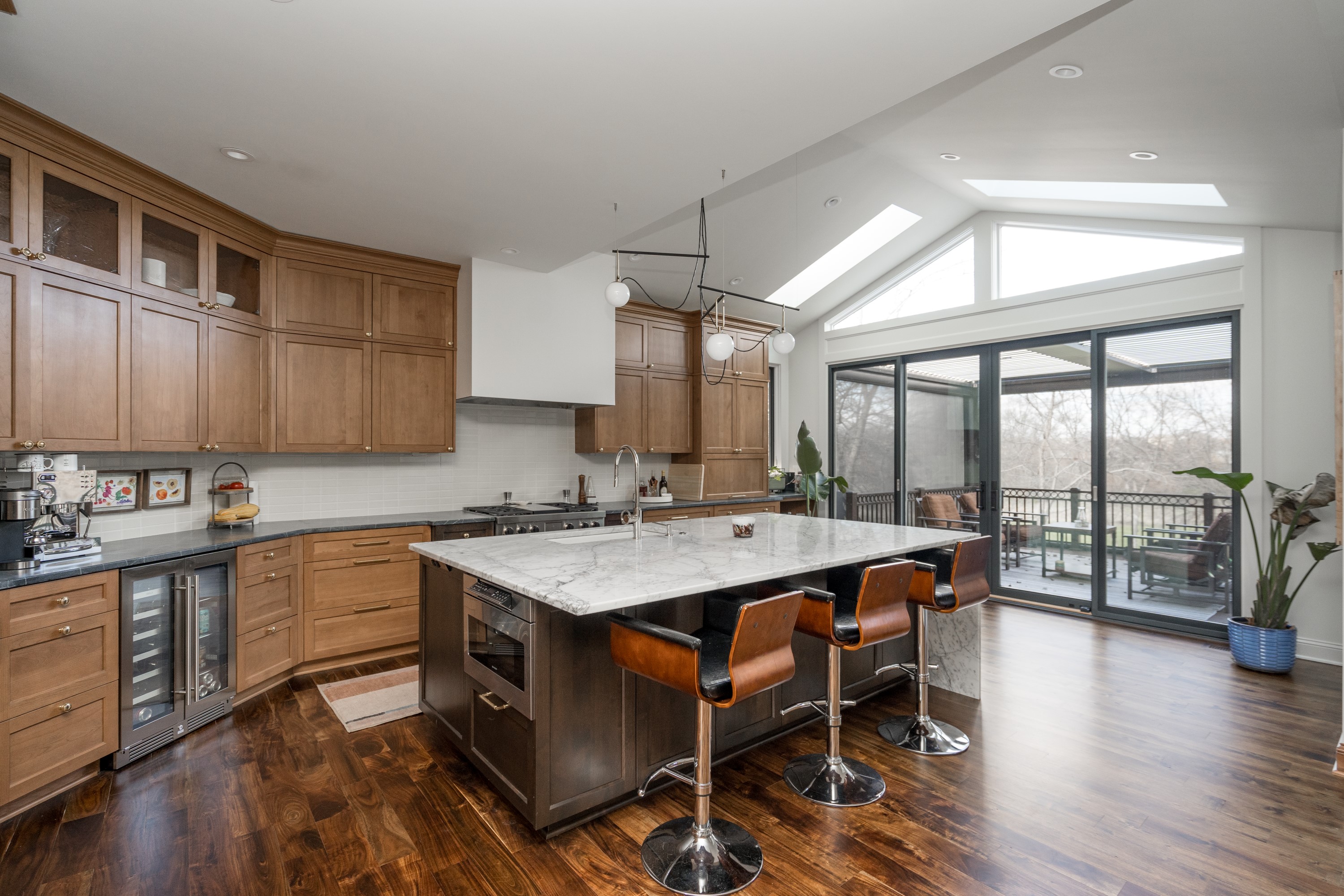 Kitchen detail with wood cabinets and tile backsplash