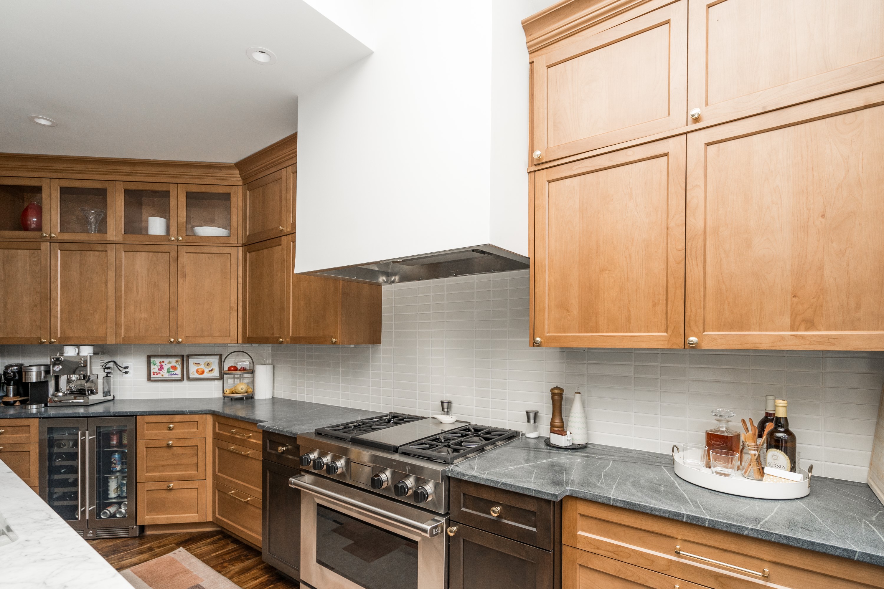 Kitchen cabinetry detail with glass uppers