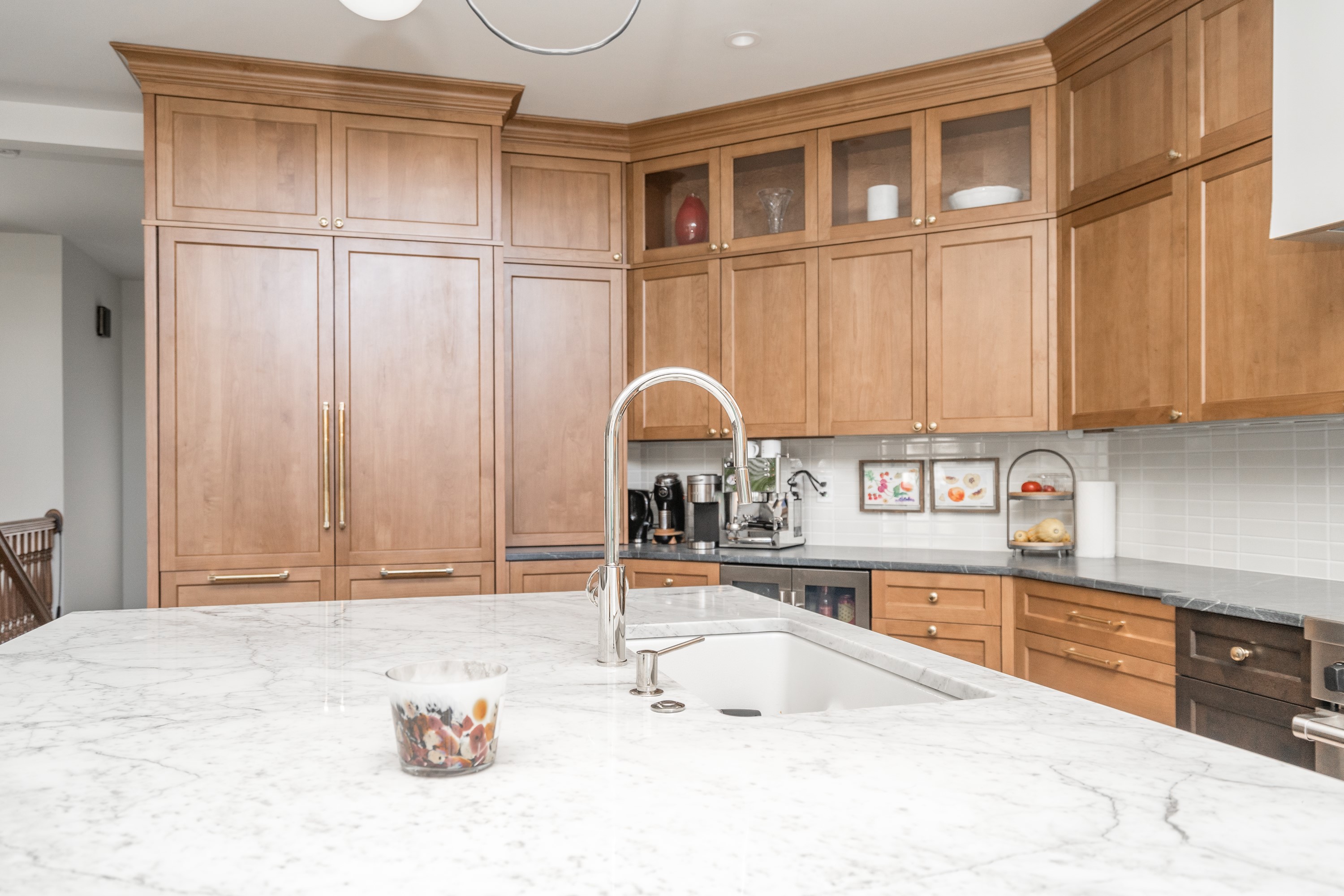 Kitchen with floor-to-ceiling custom cabinets