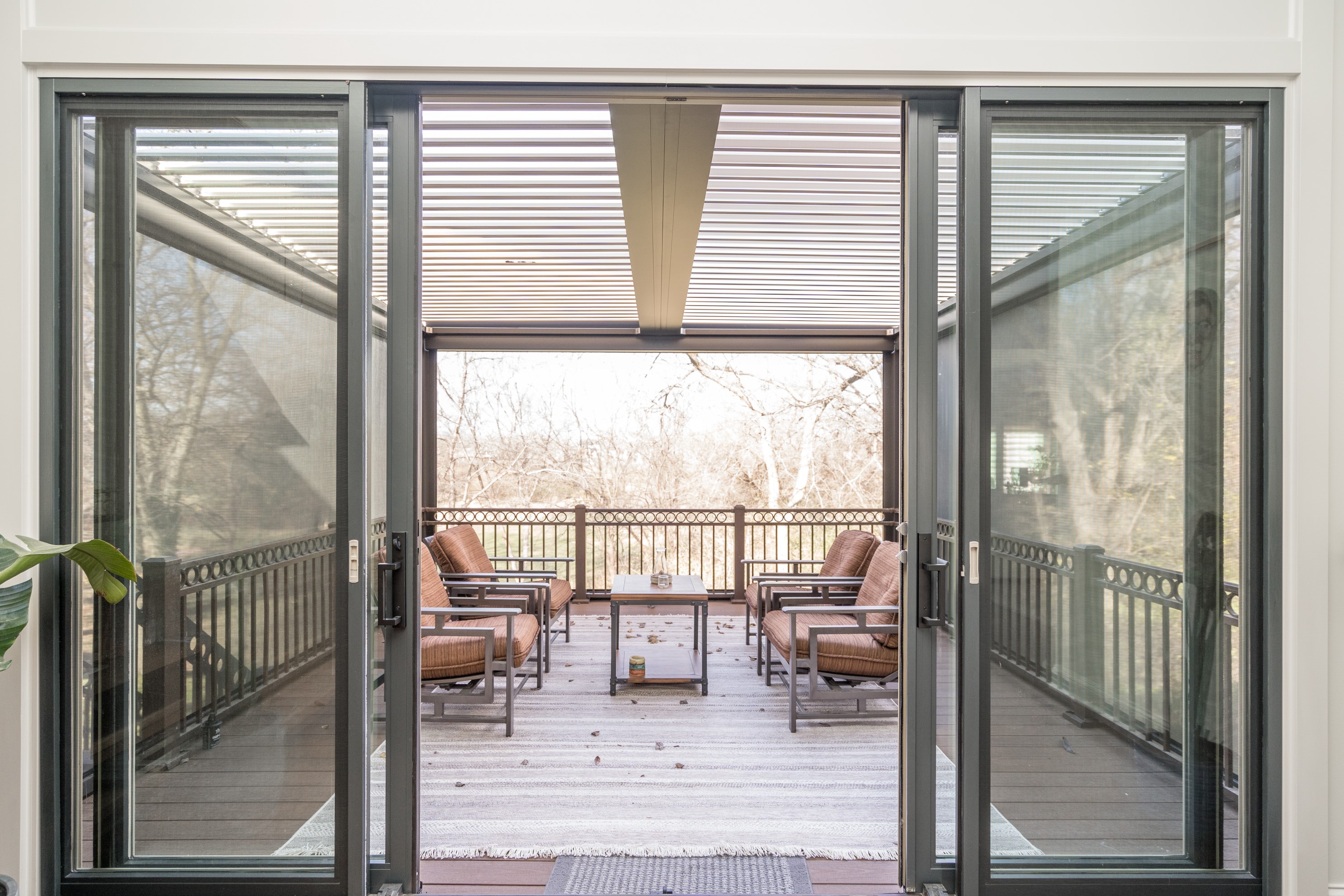 Covered deck with sliding glass doors